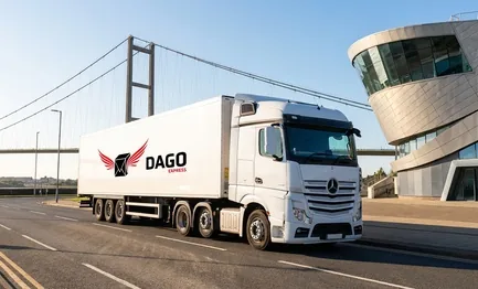 DAGO Express courier service truck in front of The Deep Aquarium and Humber Bridge in Kingston upon Hull